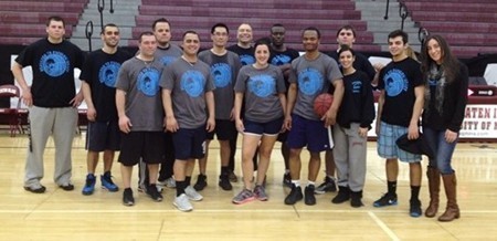 FACULTY/STAFF GRABS A WIN OVER THE STUDENTS, 54-50