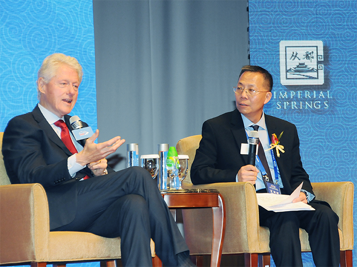 President Clinton joined by School of Business Prof in China