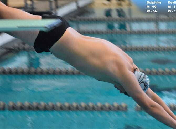 DOLPHINS FALL TO DEVILS IN NON-CONFERENCE MEET