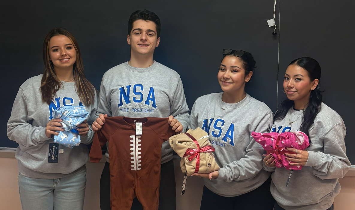 Nursing Student Alliance displaying Pajamas for theor pajama drive